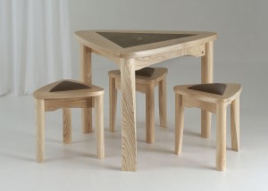 Image of Triangular table and stools